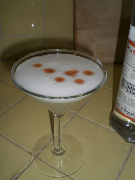 Christy was baking and had some egg whites left over. A perfect excuse for a refreshing Pisco Sour! flickr-ginsnob-2342502540.jpg