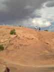 Hikers under storm