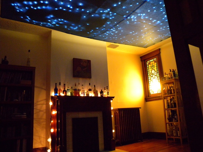 We still need to find furniture but the library / bar has plenty of alcohol, stained glass and hacked together 'stars'. flickr-ginsnob-8107154253.jpg