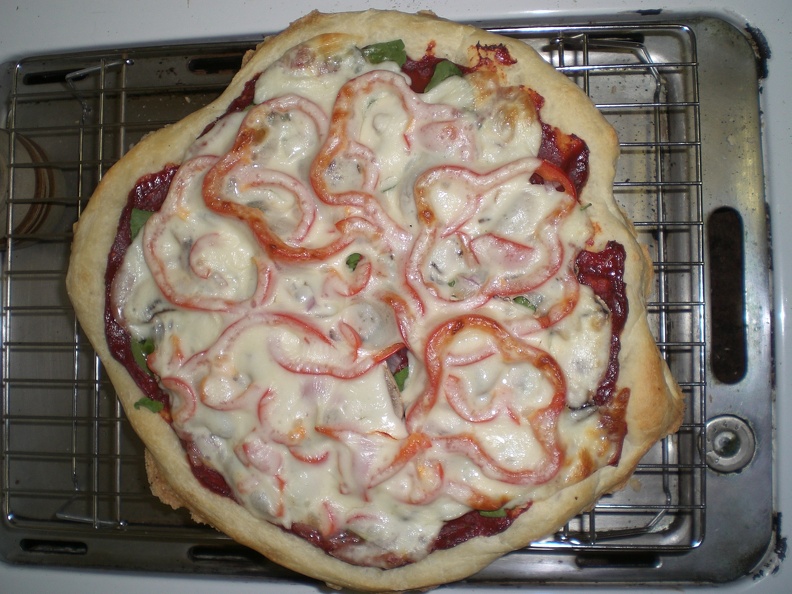 We've been making a fair number of pizza's, once a week or so. While all are ridiculously tasty, few are as perfect looking as this one.
I'm not sure why I'm posting pictures, but it's hard not to get excited about a pizza this lovely. Maybe that's just me. flickr-ginsnob-3001198191.jpg