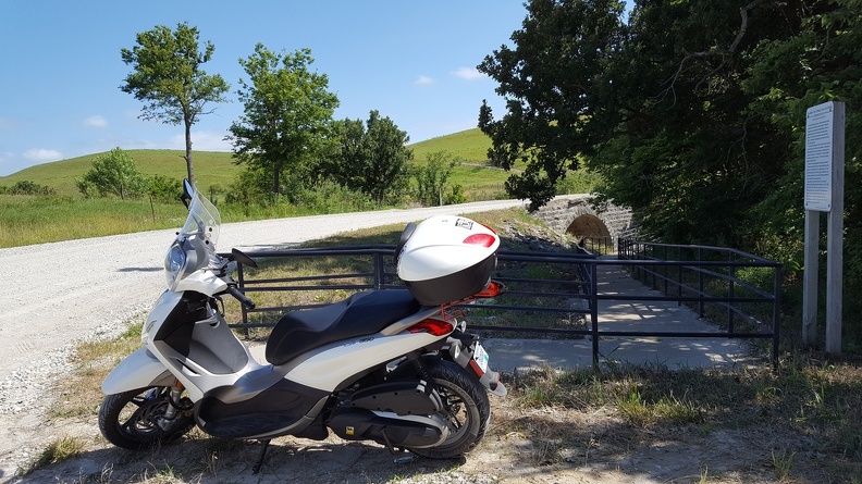 Historic Natural Stone Bridge - 6 miles this way! A few miles over a very fun road (possibly more fun because I seemed to be the only one on it and it didn't have any speed limit signs, which clearly means one million miles per hour) and then a couple miles of gravel (I only almost totally lost it once, I've been enjoying playing on gravel roads) lead you to this! This is why you can't trust signs. 2016-07-04 16.17.09.jpg