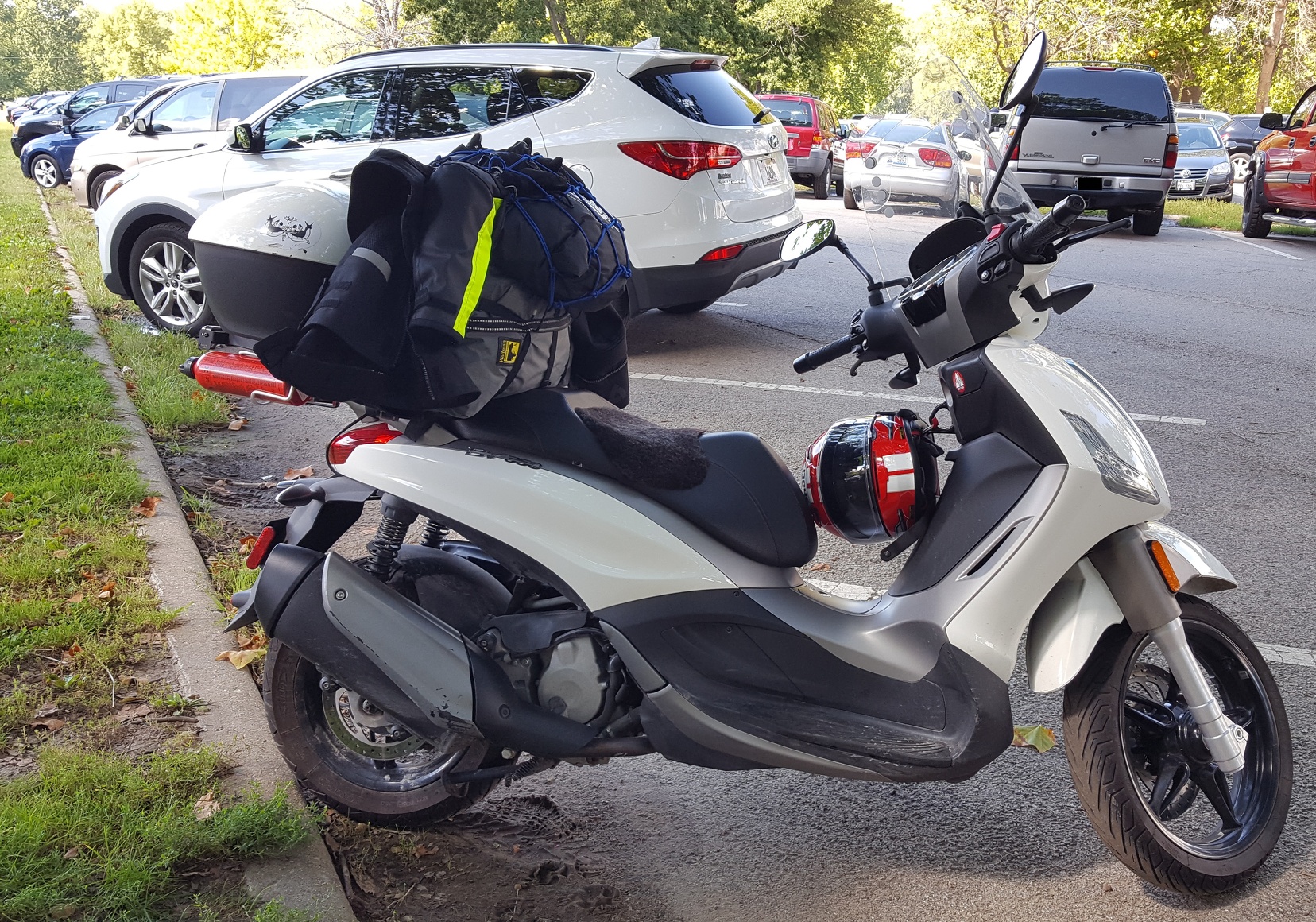 That's a lot of stuff for one tiny scooter!