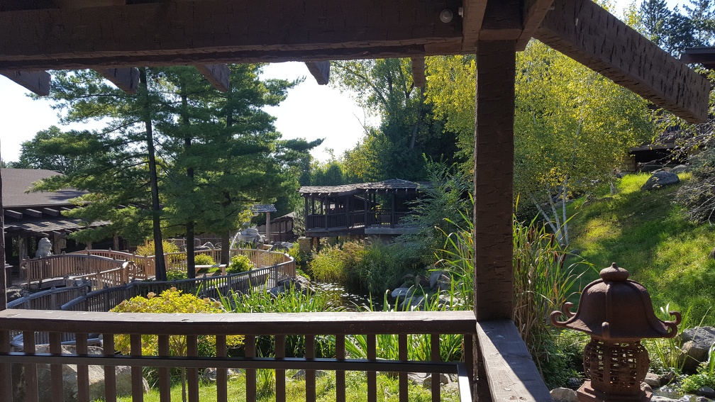 You buy your tickets and are given four golden coins to activate music machines and strange contraptions later. Then back outside to wander through Asian inspired gardens. Seem like there's kind of a lot jammed in here? We have not yet begun to jam.