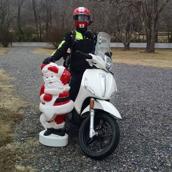 20161217 by AE Chris on Scooter with Santa.jpg