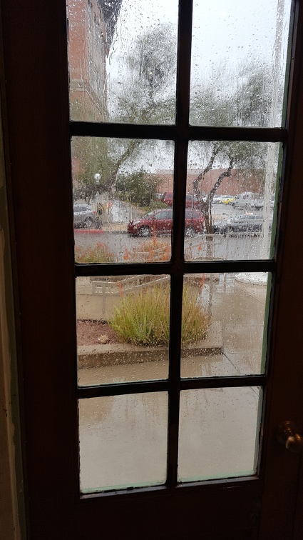 Rain behind a glass door.
