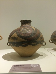 Pottery jar with two handles, painted with spiral design