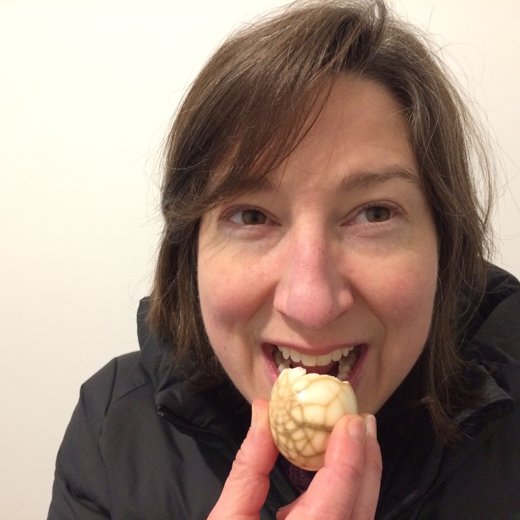 Christy Enjoys Tea Egg