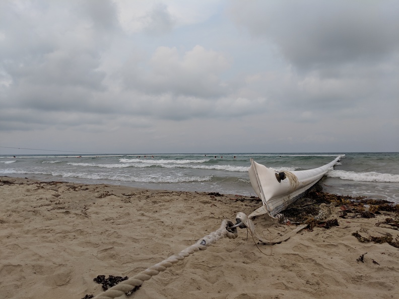There's a giant winch used to let the rope out and move the net out to sea during low tide, and pull it up at high tide. The netting is weighed down by thick chain. 2018-12-01 17.35.12.jpg